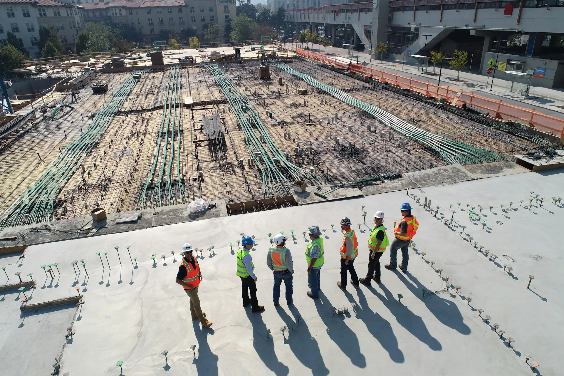 Aerial view of a large sitework project with crew
